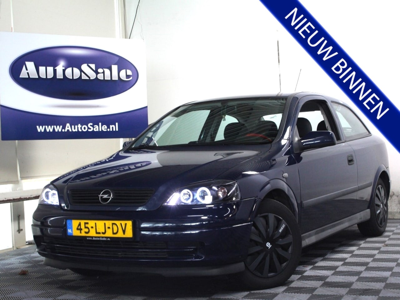 Opel Astra - 1.6 GL NAP TREKHAAK ANGLE-EYES '03 - AutoWereld.nl