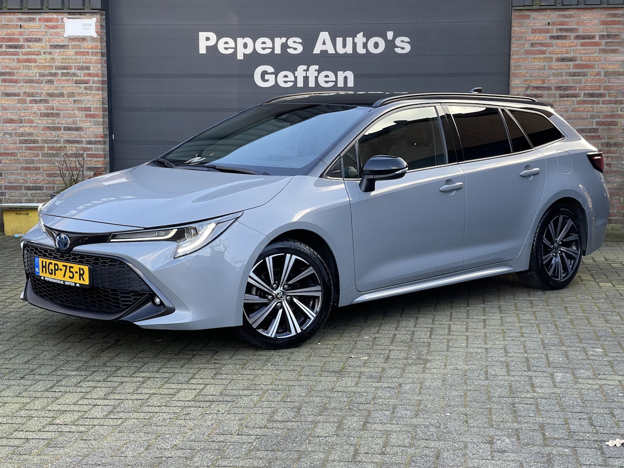 Toyota Corolla Touring Sports - 1.8 Hybrid Dynamic Head Up Keyless Navi Camera Stuurverw. - AutoWereld.nl