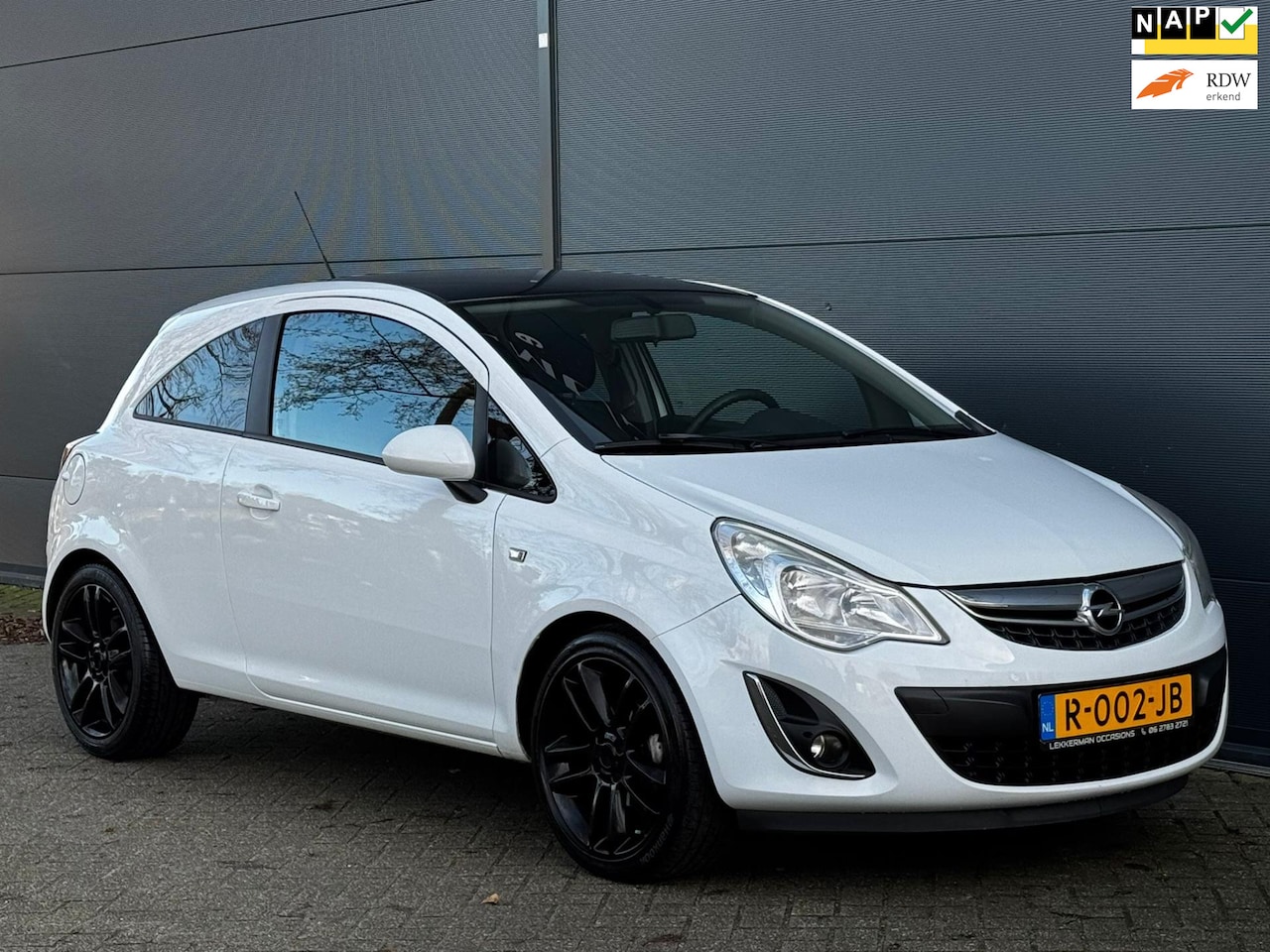 Opel Corsa - 1.4-16V Edition SPORT AIRCO NAVI PDC - AutoWereld.nl