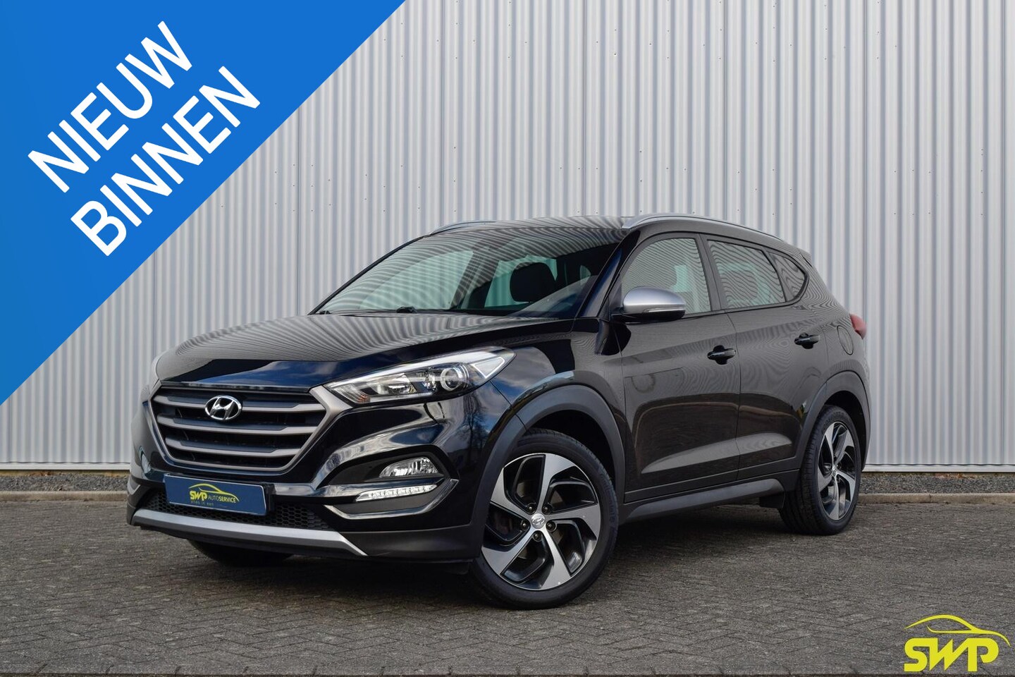 Hyundai Tucson - 1.6 T-GDi 4WD | Navi | Cam | 18 inch - AutoWereld.nl