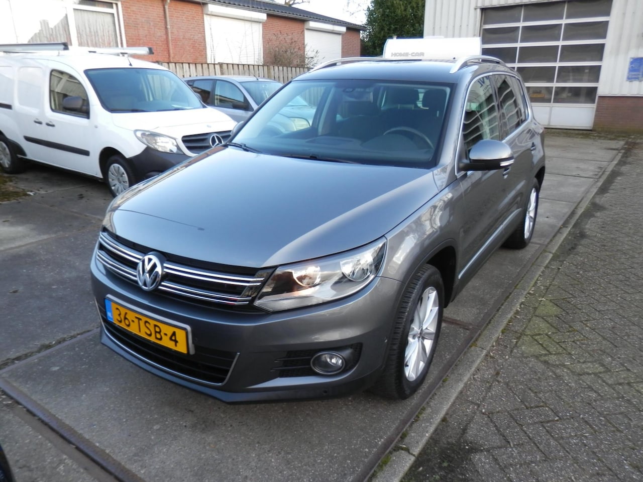 Volkswagen Tiguan - 1.4 TSI Sport&Style airco - AutoWereld.nl