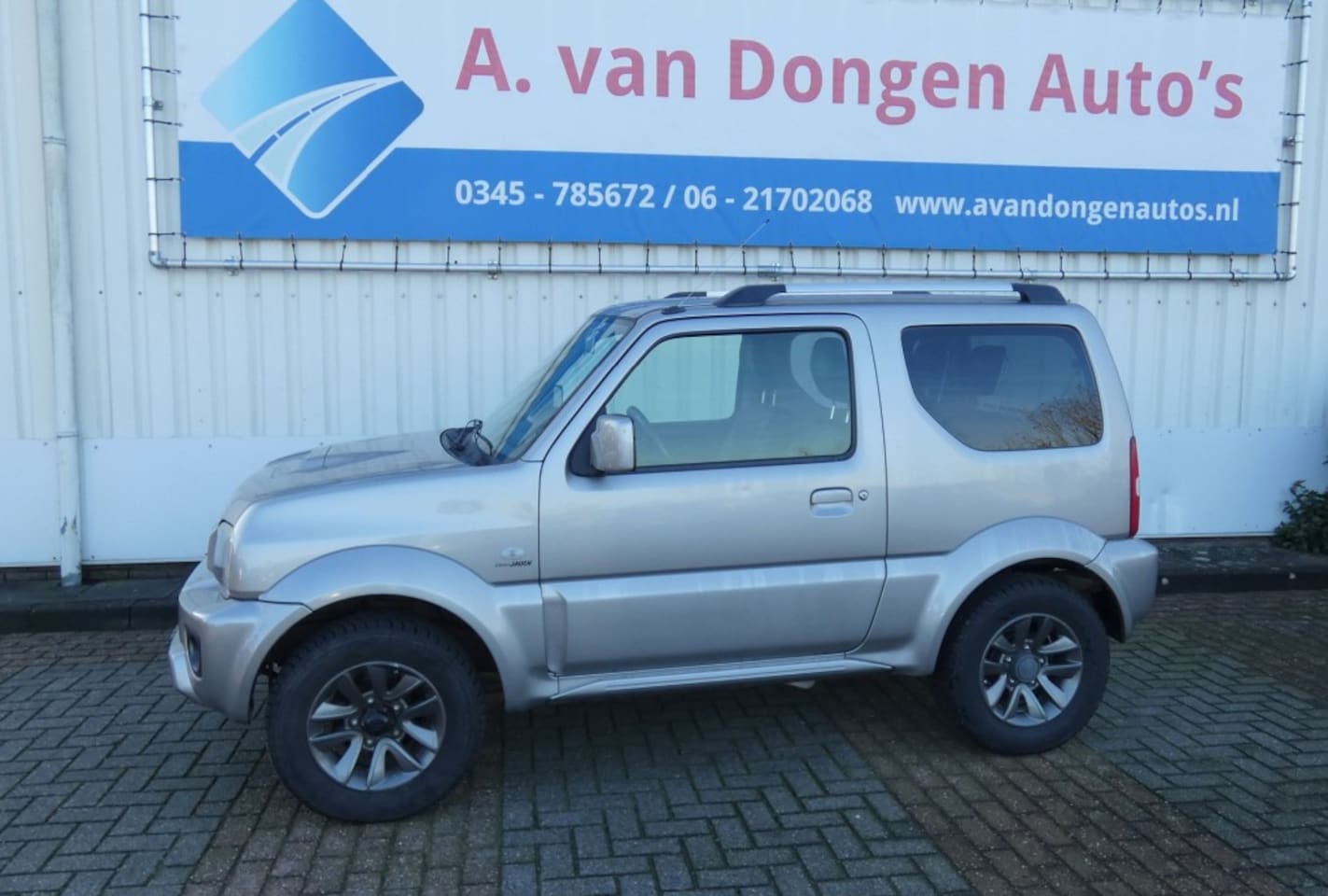 Suzuki Jimny - 1.3 EXCLUSIVE 4WD,Leer,Stoelverw,1e Eignr,Trhaak - AutoWereld.nl