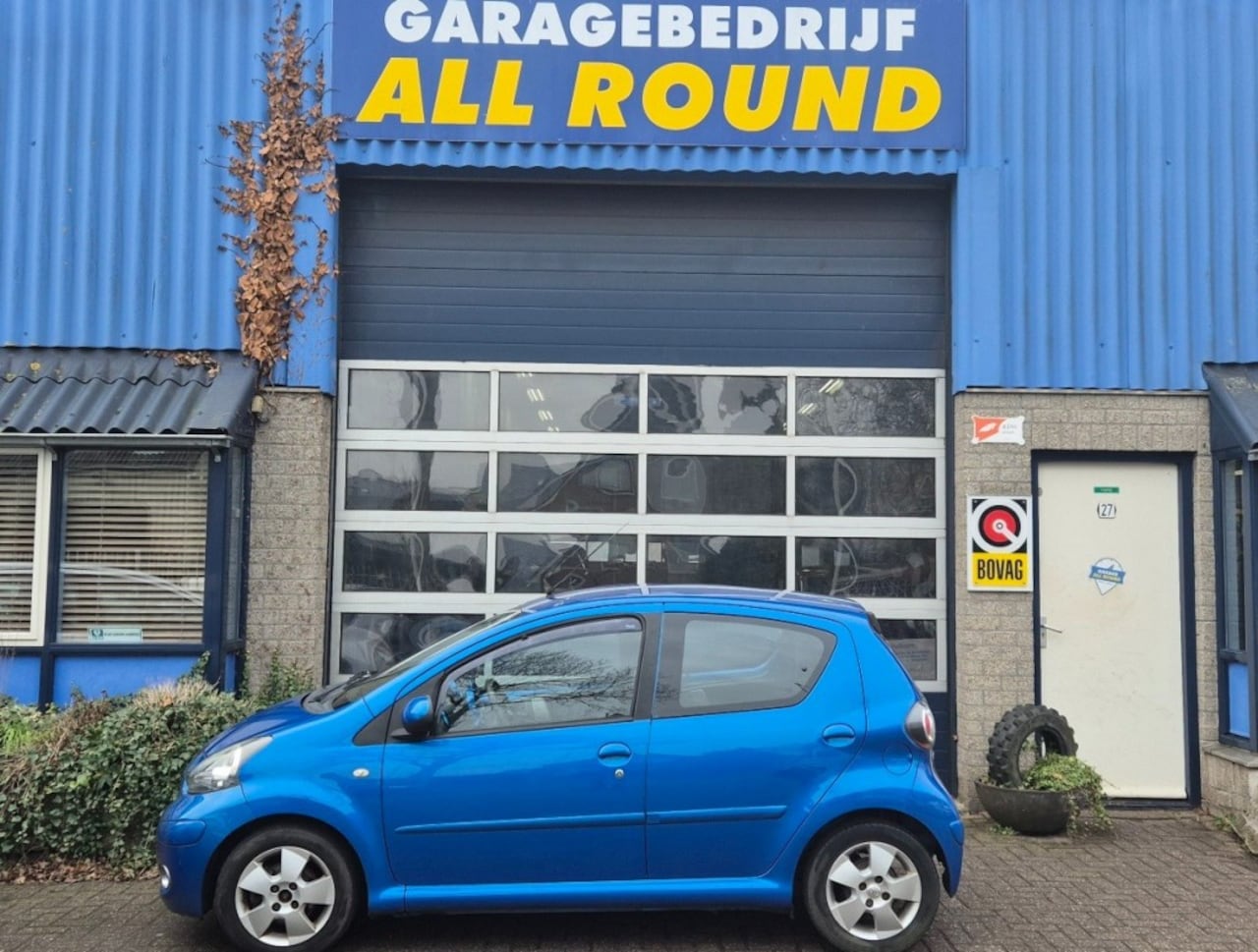 Toyota Aygo - 1.0-12v Dynamic Bleu*cruise*airco*lichtmetaal*automaat - AutoWereld.nl