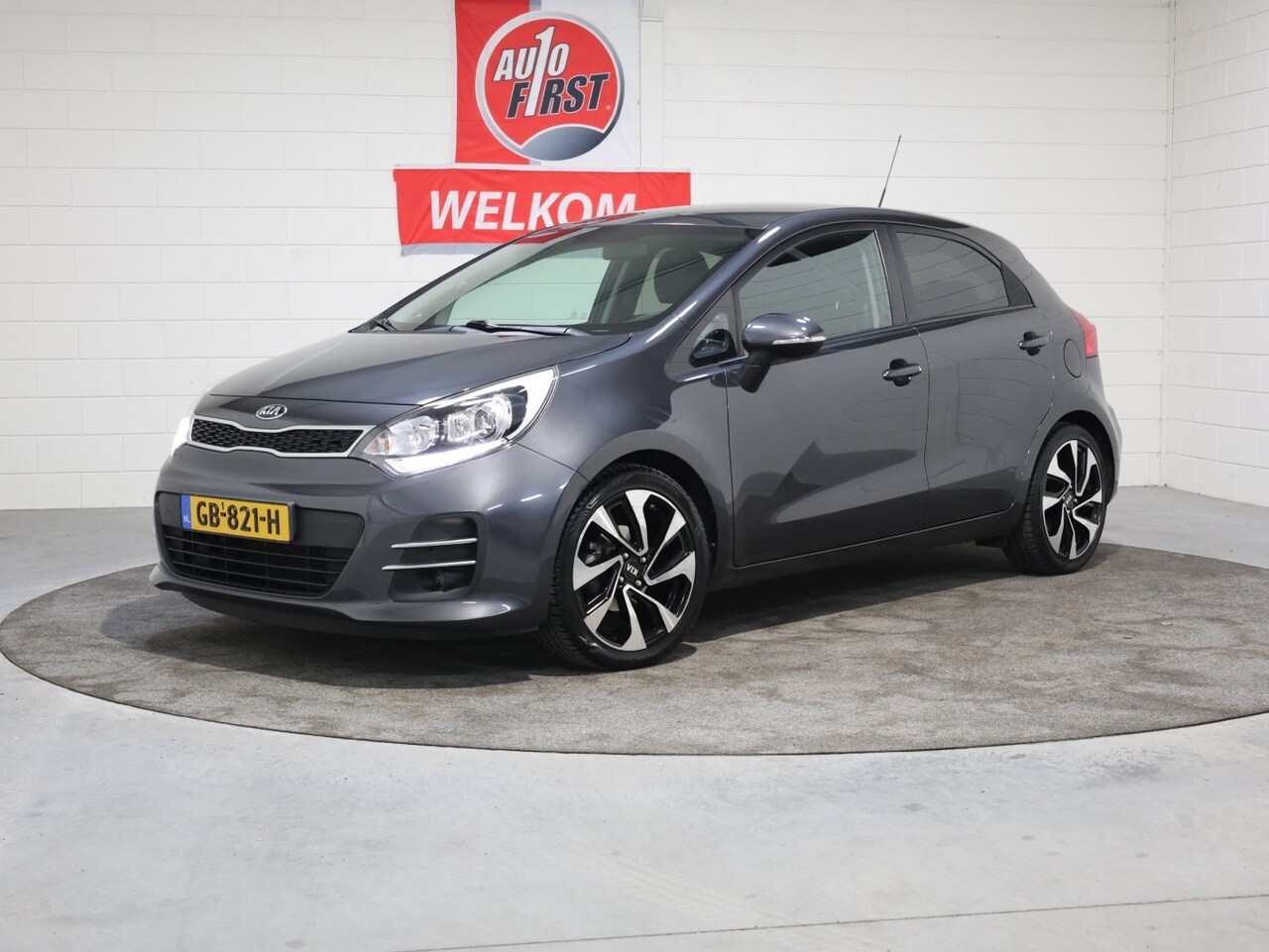 Kia Rio - 1.2 CVVT ExecutiveLine 1.2 CVVT Executive Line, Clima, Cruise, Navi, Achteruitrijcamera, Blue tooth, Isofix, 100% - AutoWereld.nl