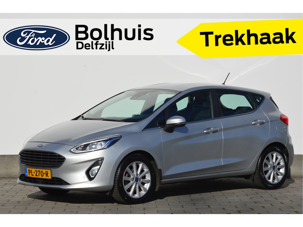 Ford Fiesta - EcoBoost Titanium 100 pk | Navi | Trekhaak | Adaptiv Cruise | Voorruitverwarming | 100% De - AutoWereld.nl