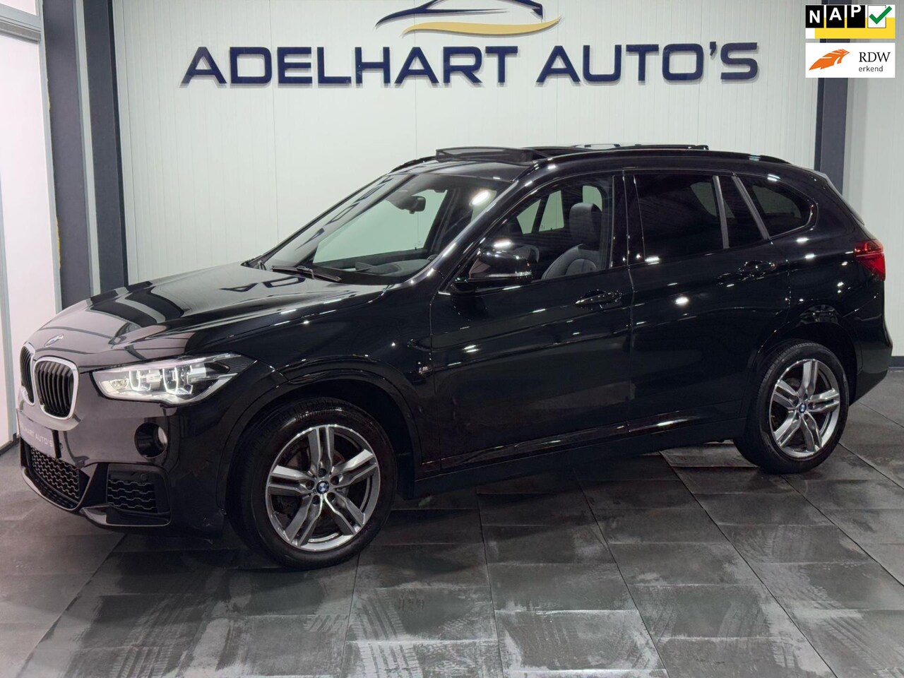 BMW X1 - SDrive18i Executive M Sport / Panorama dak / HUD / Automaat / Lederen interieur / Cruise c - AutoWereld.nl