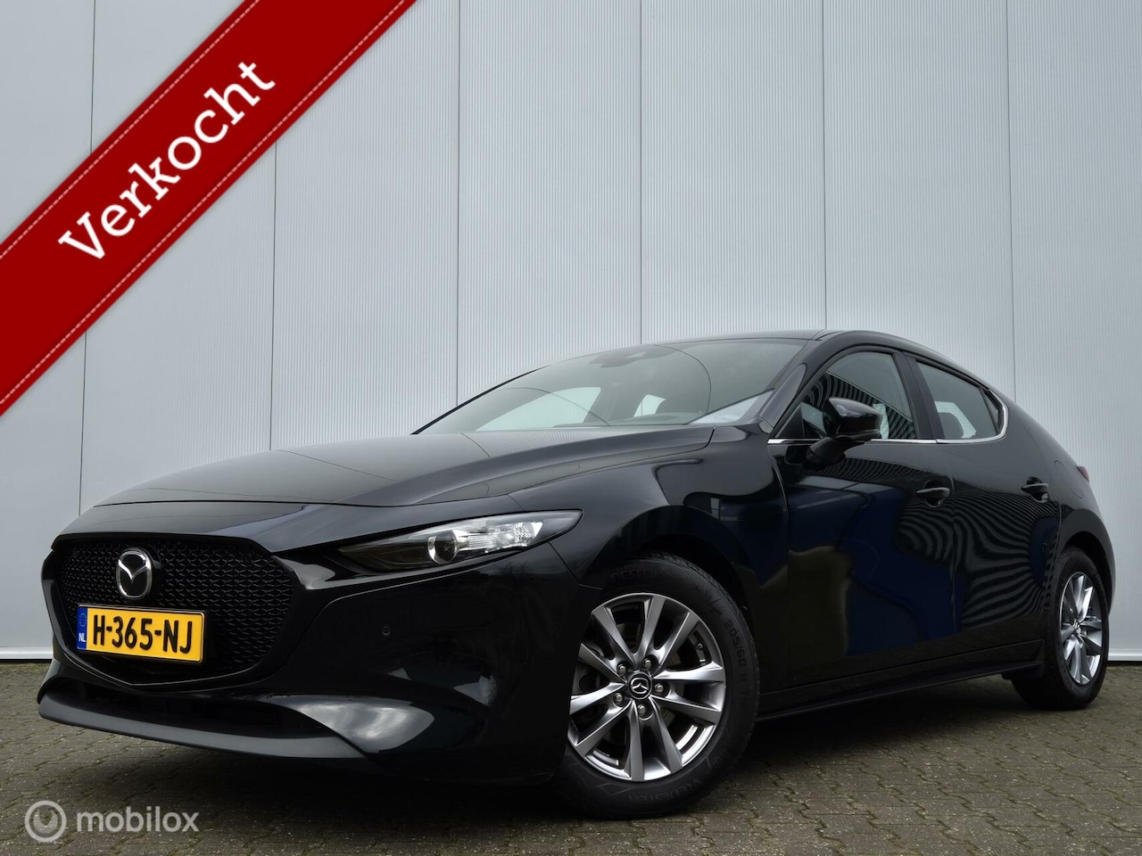 Mazda 3 - 2.0 E-SKYACTIV-G M Hybrid 122 BOSE AUTOMAAT/LEDER/LED/CAMERA/STOEL-STUURVERWARMING/KEYLESS - AutoWereld.nl