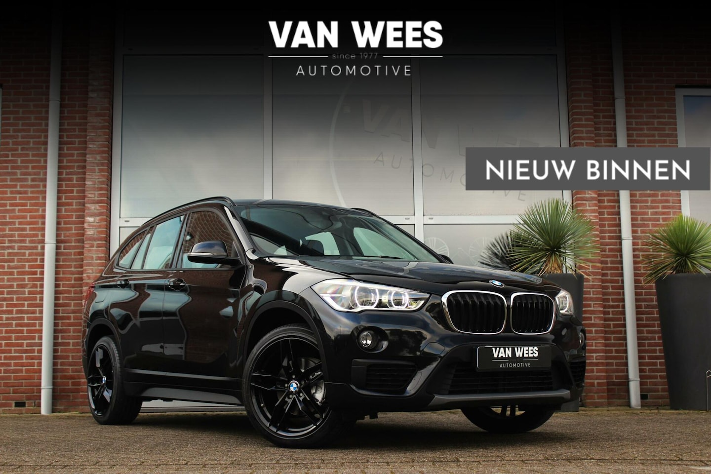 BMW X1 - sDrive18i F48 Executive | 2e eigenaar | 19 inch | LED | NL auto | Navi | PDC | Trekhaak | - AutoWereld.nl