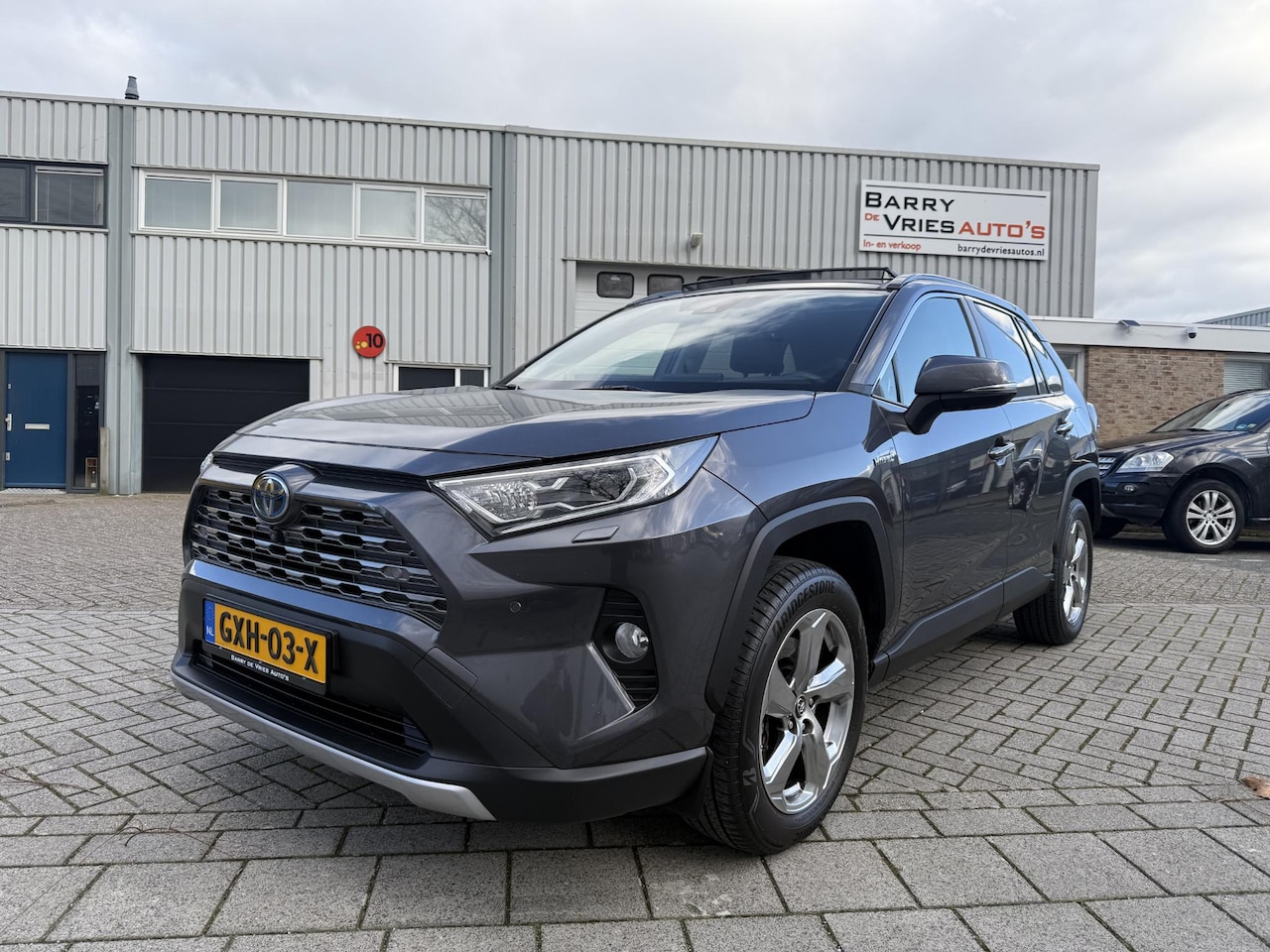 Toyota RAV4 - 2.5 Hybrid AWD Executive Lounge | Panoramadak | 1650 Kg Trekgewicht | Adaptive cruise cont - AutoWereld.nl