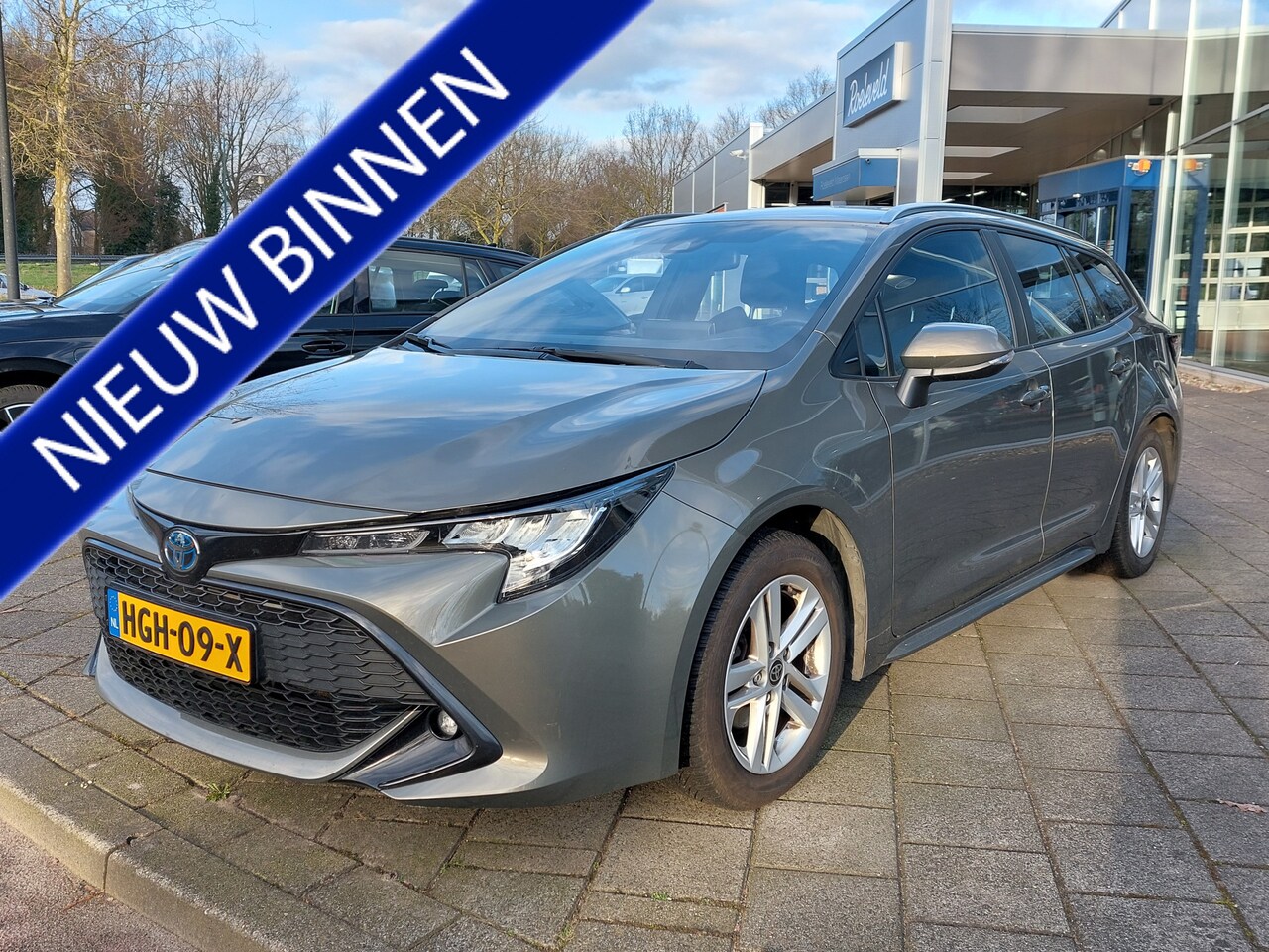 Toyota Corolla Touring Sports - 1.8 Hybrid Business | Navi | Apple Carplay+Android Auto | Clima | Adap.Cruise | Led Koplam - AutoWereld.nl