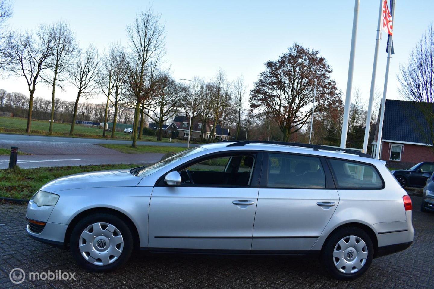 Volkswagen Passat Variant - 2.0 FSI Comfortline clima|cruise - AutoWereld.nl