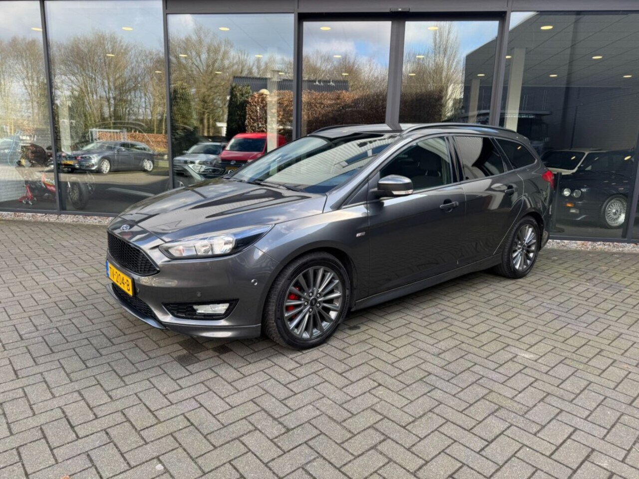 Ford Focus Wagon - 1.0 ST-Line Wagon 1.0 ST-Line,Winterpack,Carplay,Navi,Clima,Cruise,PDC,Trekh - AutoWereld.nl