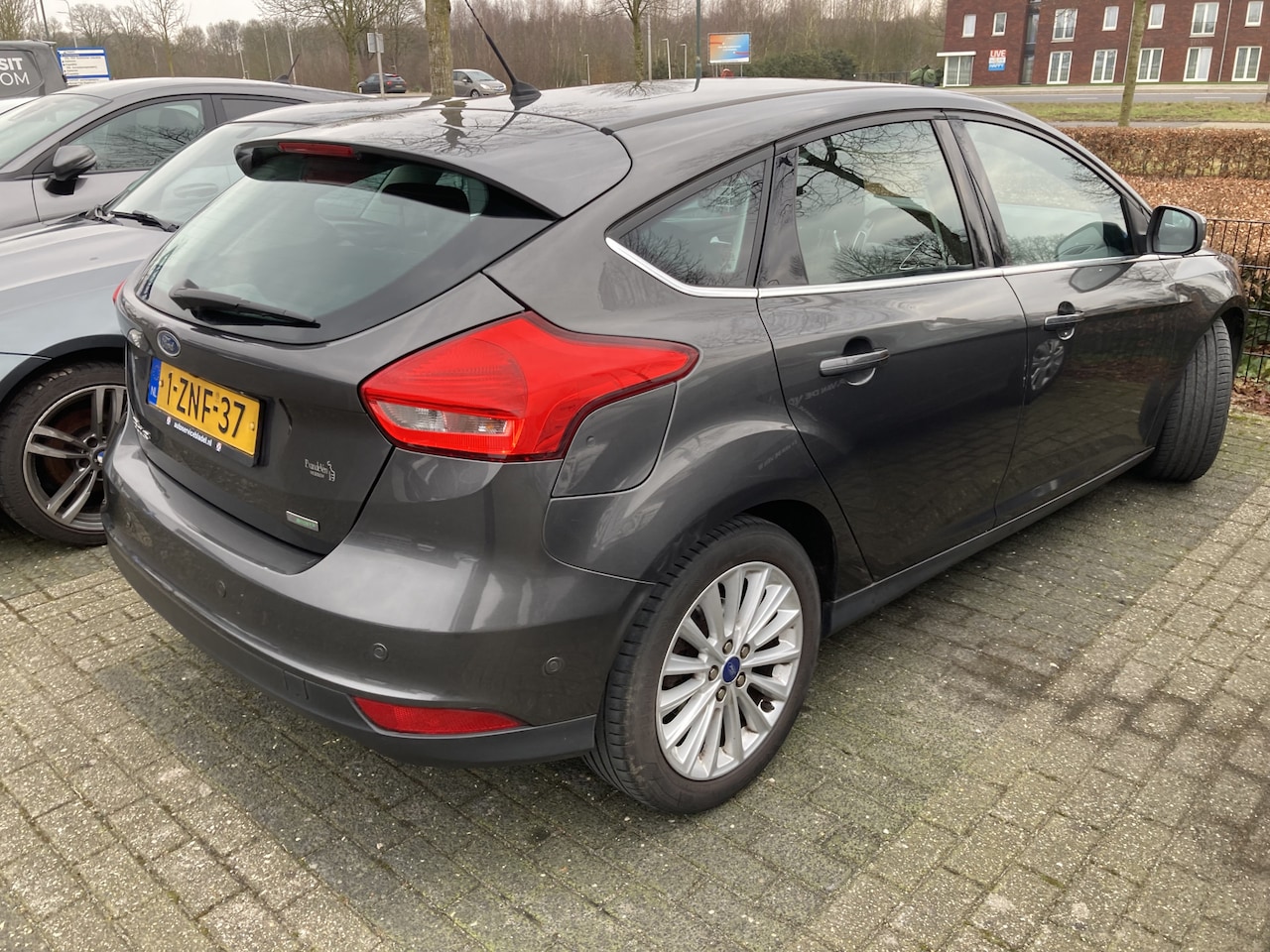 Ford Focus - 1.0 EcoBoost Titanium 125pk/92kW 6-bak - AutoWereld.nl