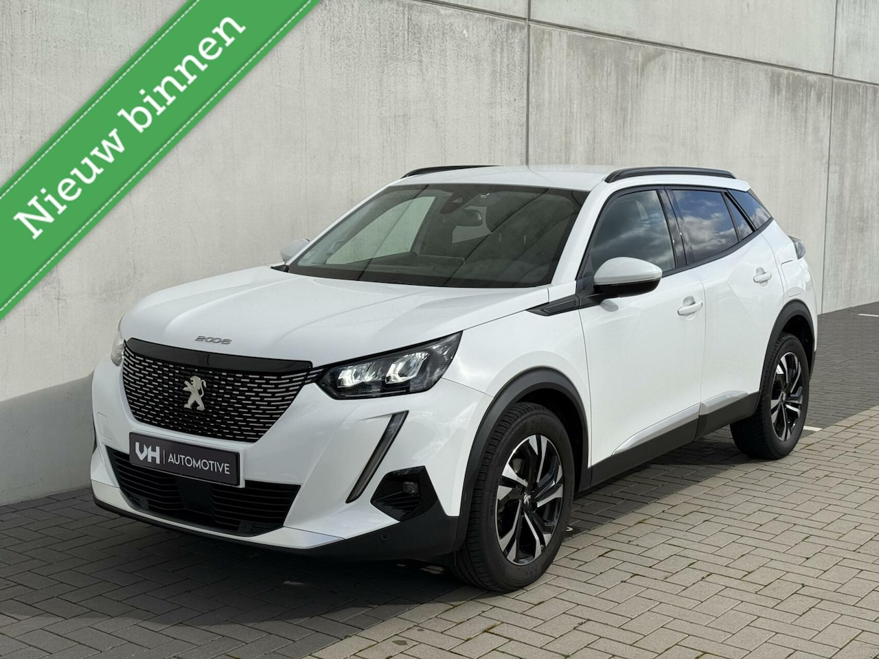 Peugeot 2008 - 1.2 Allure - LED - CarPlay - camera - clima - AutoWereld.nl