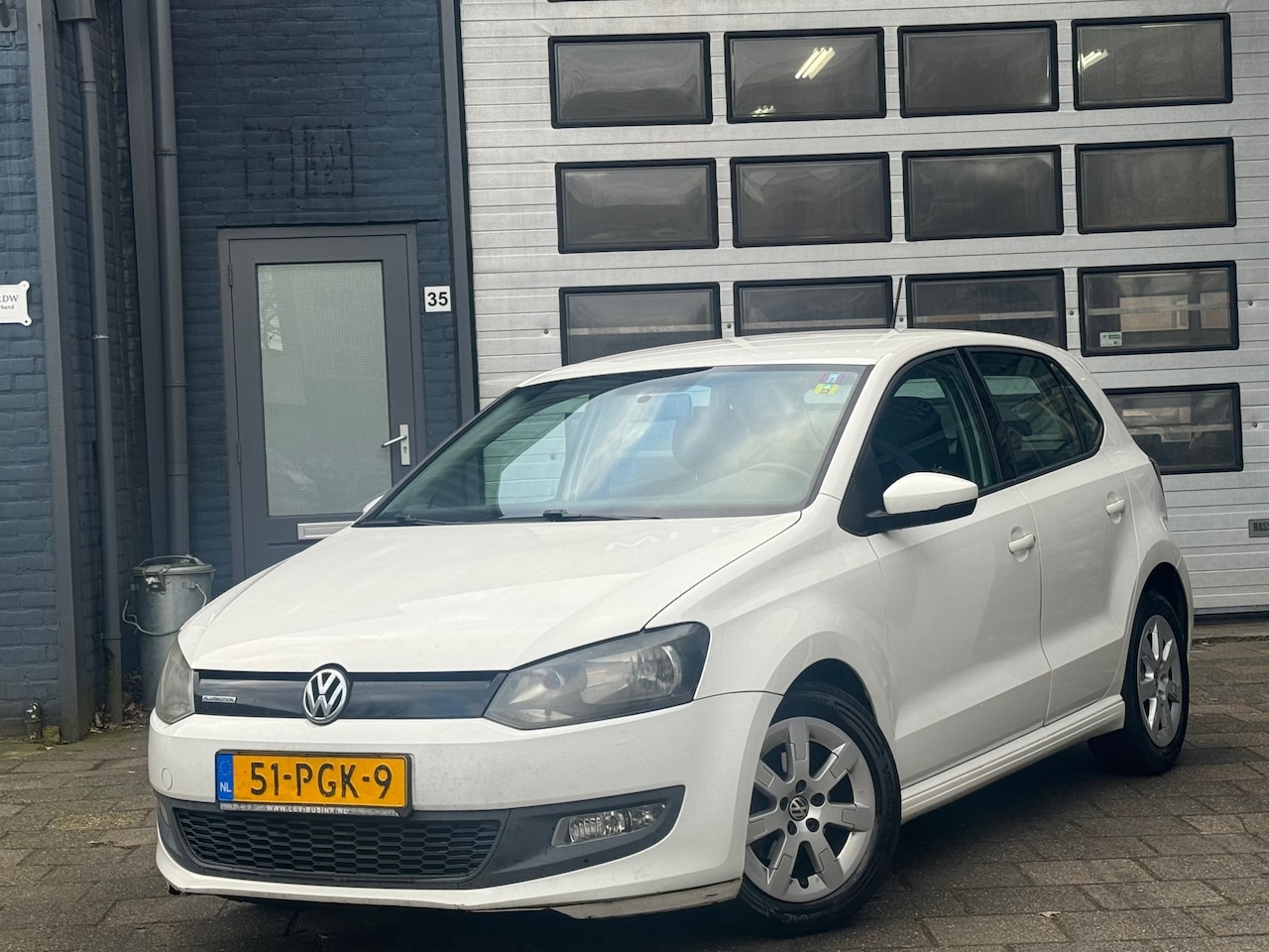 Volkswagen Polo - 1.2 TDI BlueMotion Comfortline | Airco | Navi | Cruise - AutoWereld.nl