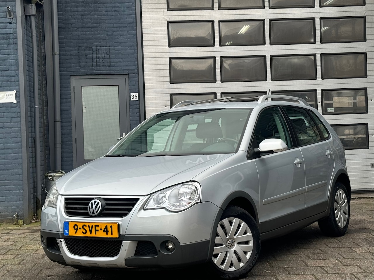 Volkswagen Polo - 1.4-16V Cross | Airco | Cruise | Schuif-Dak | NW APK - AutoWereld.nl