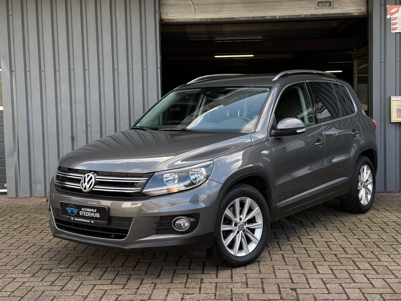 Volkswagen Tiguan - 1.4 TSI Sport&Style - AutoWereld.nl