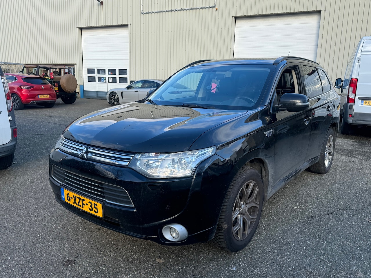 Mitsubishi Outlander - 2.0 PHEV Executive Edition | Clima | Navi | MOTOR TIKT - AutoWereld.nl