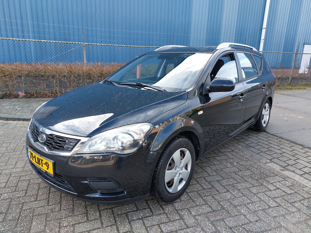 Kia Cee'd Sporty Wagon - 1.4 CVVT X-tra AIRCO - AutoWereld.nl