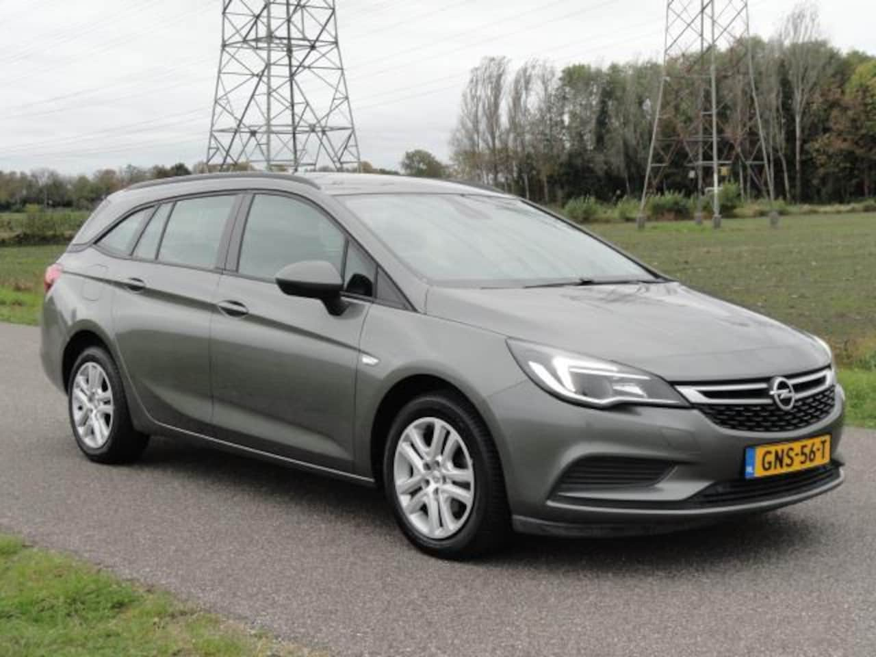 Opel Astra Sports Tourer - 1.0 TURBO l LED / ECC / NAV / ANDROID / PDC - AutoWereld.nl