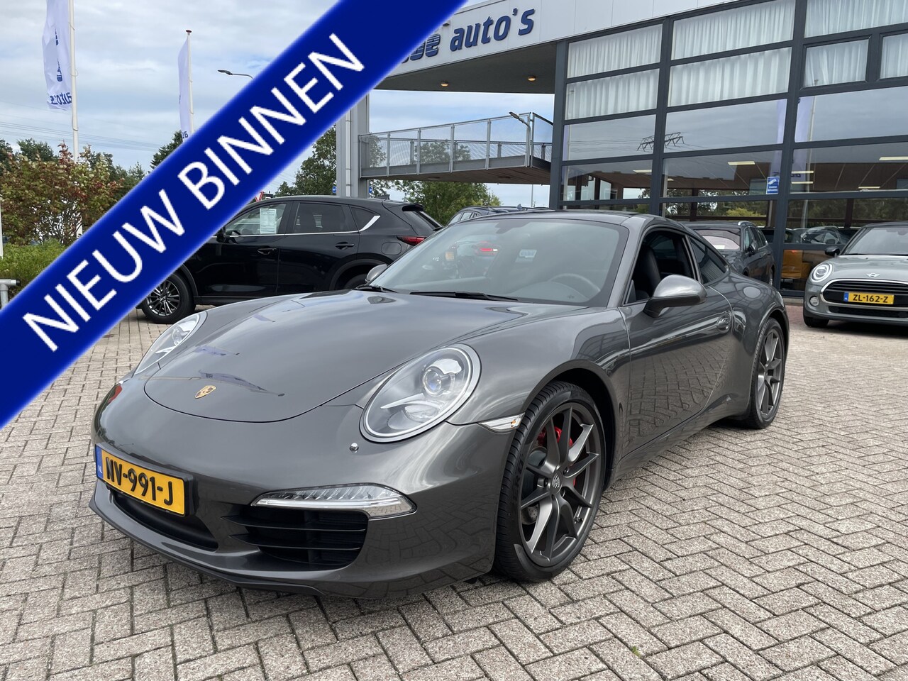 Porsche 911 - 3.4 Carrera 2 PDK Schuifdak Navigatie Alcantara Hemel Xenon Plus 20 Inch S Velgen Dealer o - AutoWereld.nl