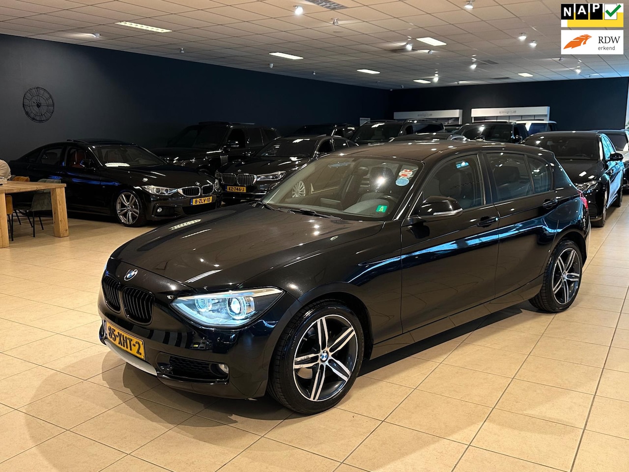 BMW 1-serie - 118i Business NL-Auto NAP Xenon Navi Klima - AutoWereld.nl