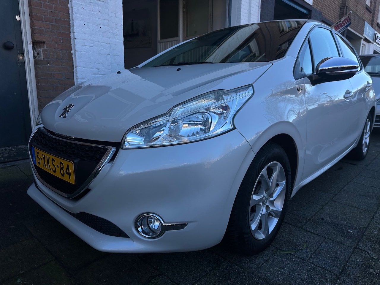 Peugeot 208 - 1.2 VTi Style Airco Cruise Parelmoer Wit Zeer Nette Auto - AutoWereld.nl