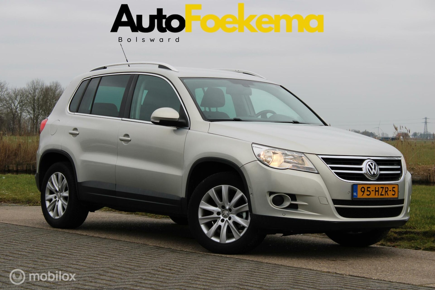 Volkswagen Tiguan - 2.0 TSI Sport&Style 4Motion TREKHAAK CLIMA AIRCO - AutoWereld.nl