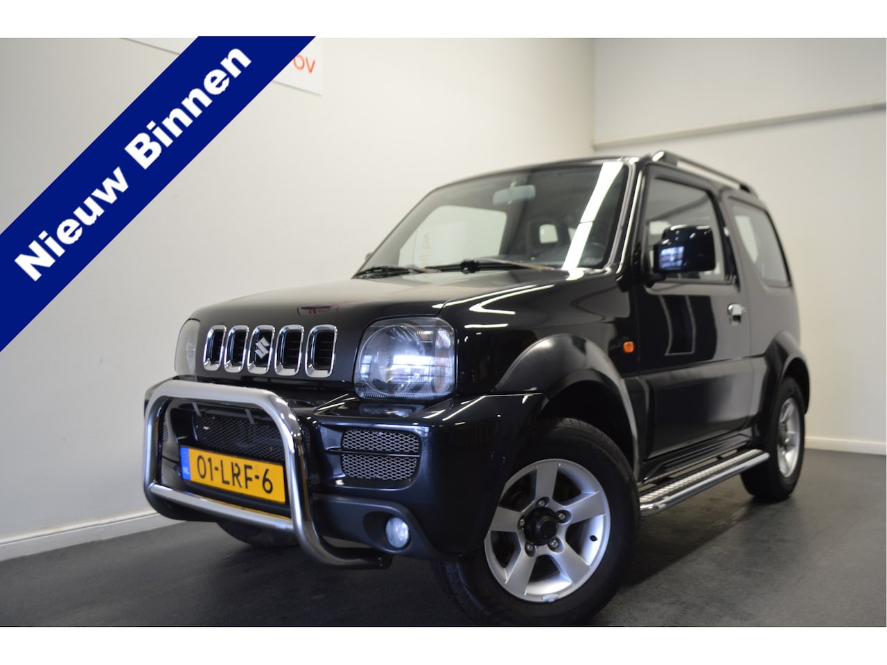 Suzuki Jimny - 1.3 JLX 4WD , MISTL V , FROND GARD , ZIJ BARS , LMV15 , RADIO , - AutoWereld.nl