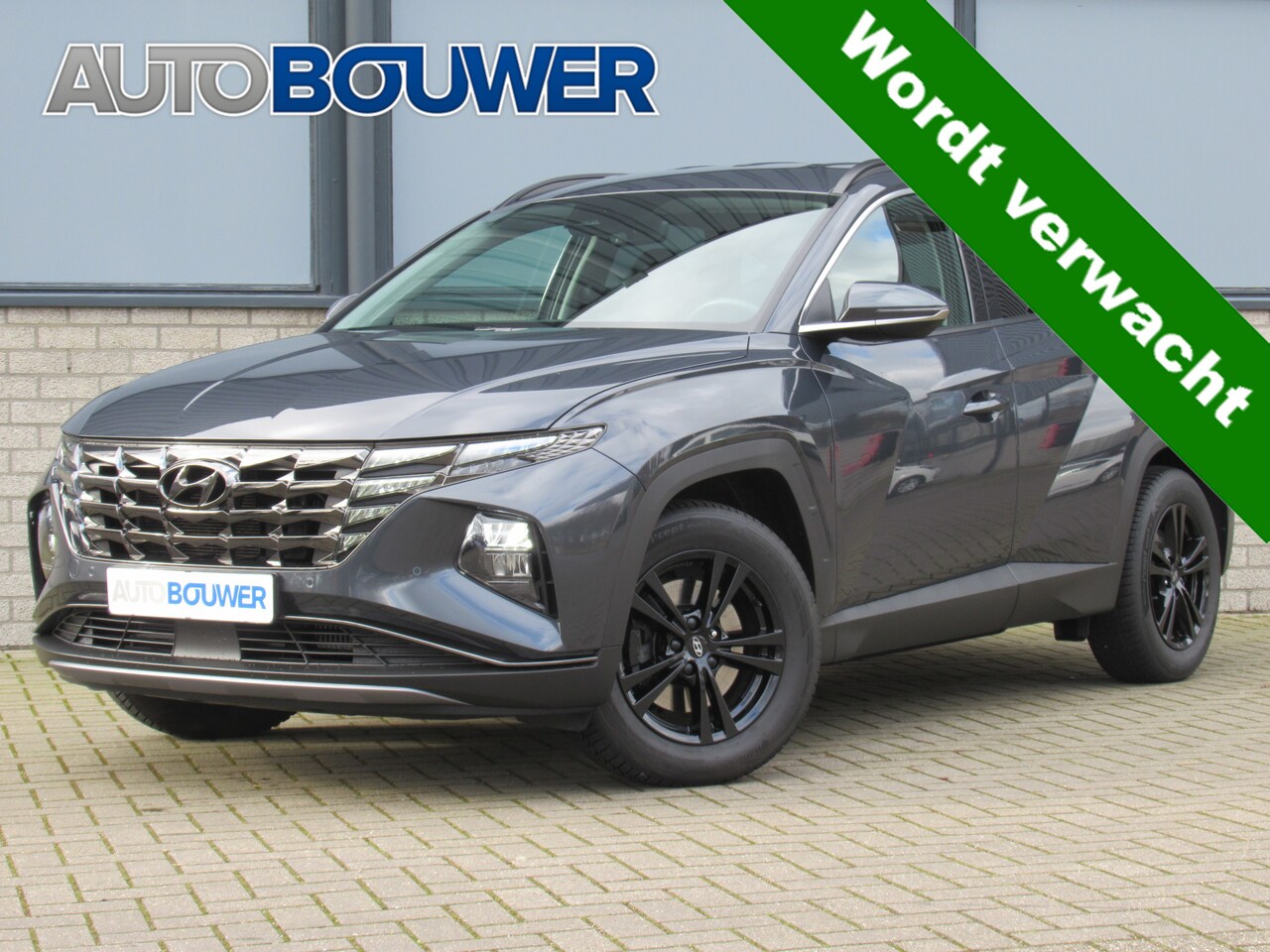 Hyundai Tucson - 1.6 T-GDI HEV 230 PK Comfort Smart 1e eigen | dealer onderh | navi | 1650 KG tr.gewicht - AutoWereld.nl