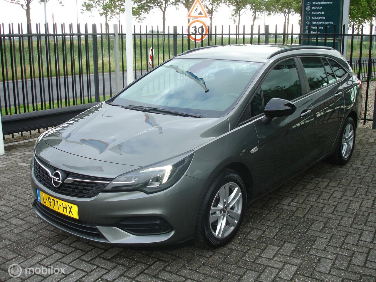 Opel Astra Sports Tourer - 1.2 Edition 1.2 Edition 130pk, Airco,Apple carplay - AutoWereld.nl