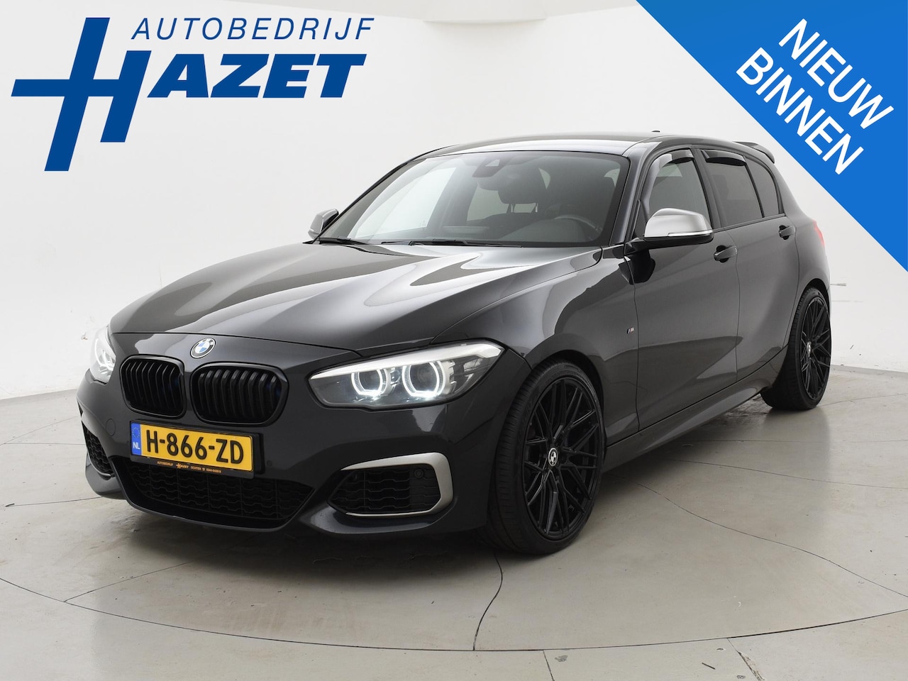 BMW 1-serie - M140i 340 PK M-SPORT AUT. + 19 INCH | NETFLIX | HARMAN KARDON | STOELVERW. | CAMERA - AutoWereld.nl