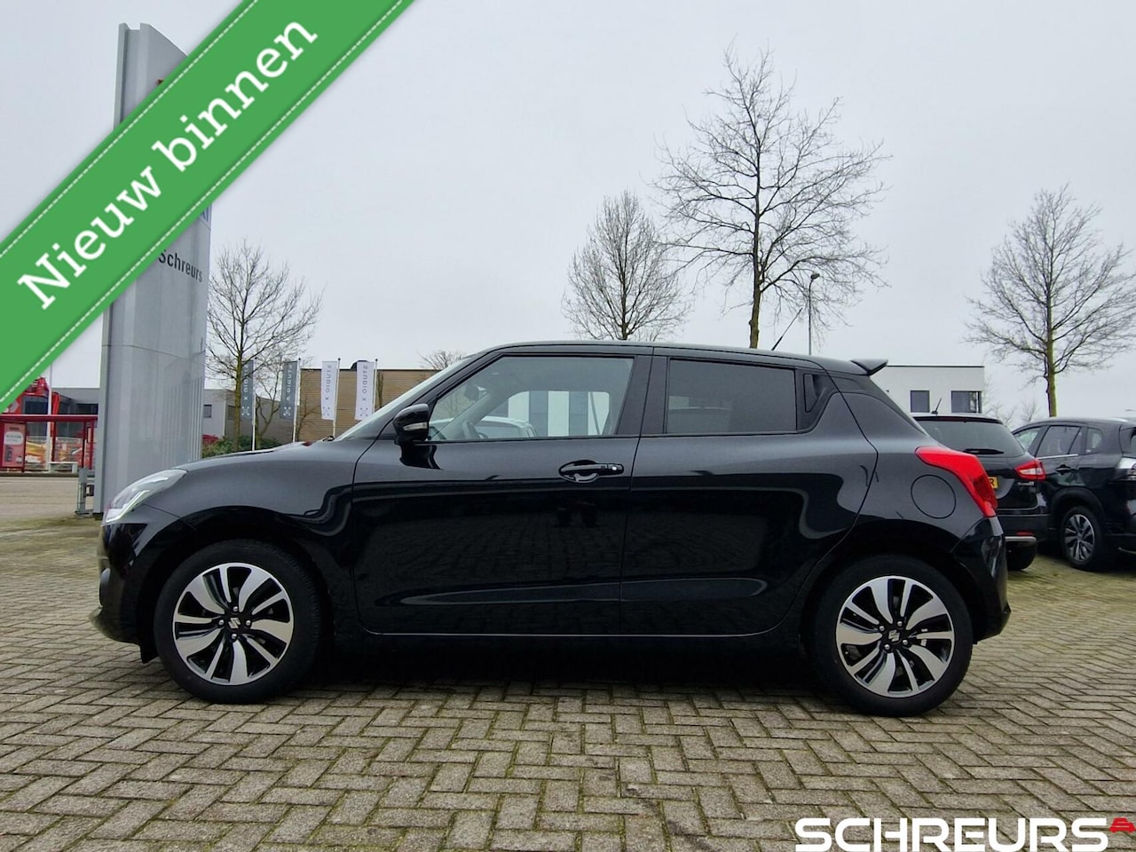 Suzuki Swift - 1.2 Stijl Smart Hybrid|Trekhaak|Dakspoiler|Rijklaar prijs|Een echte Stijl uitvoering| - AutoWereld.nl