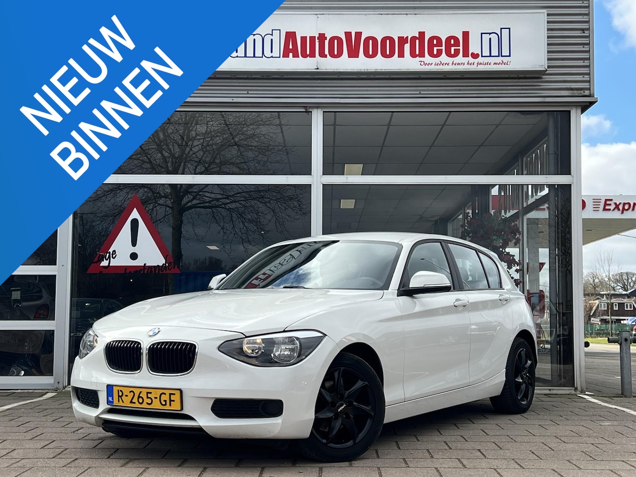 BMW 1-serie - 114i EDE 5 deurs / Airco / PDC / 2012 - AutoWereld.nl