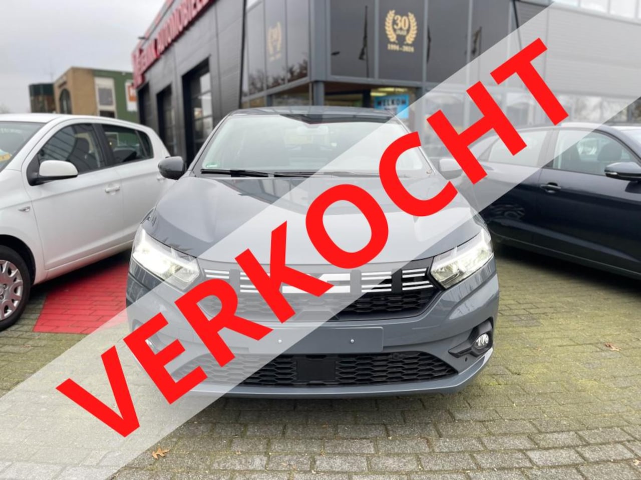 Dacia Sandero - 1.0 TCE 90 AUTOMAAT BJ.2024 NAVI CAMERA - AutoWereld.nl