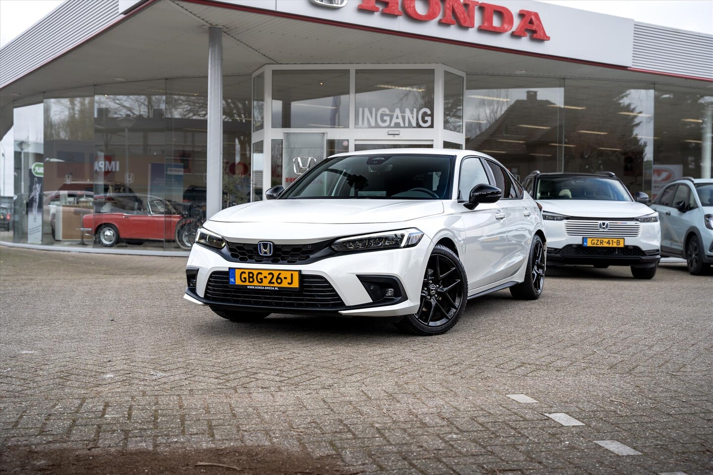 Honda Civic - 2.0 Hybrid 184pk Sport Automaat | NL Auto | All Season Banden | Auto in nieuwstaat | 18 in - AutoWereld.nl