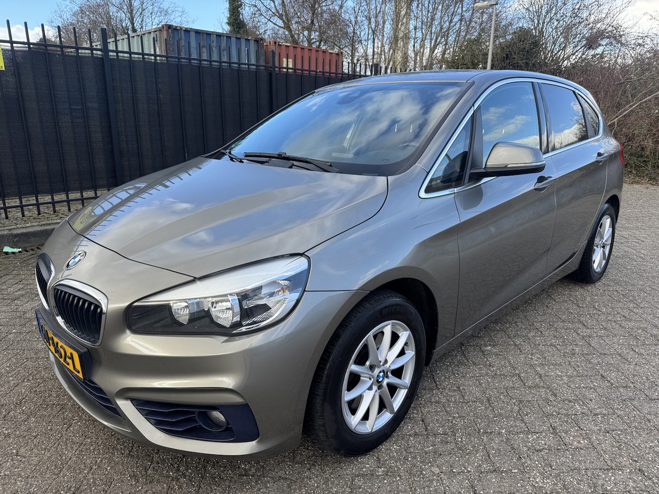 BMW 2-serie Active Tourer - 218i Sport 6 Versn Navi/Clima/Cruise/LMV/Trekh - AutoWereld.nl