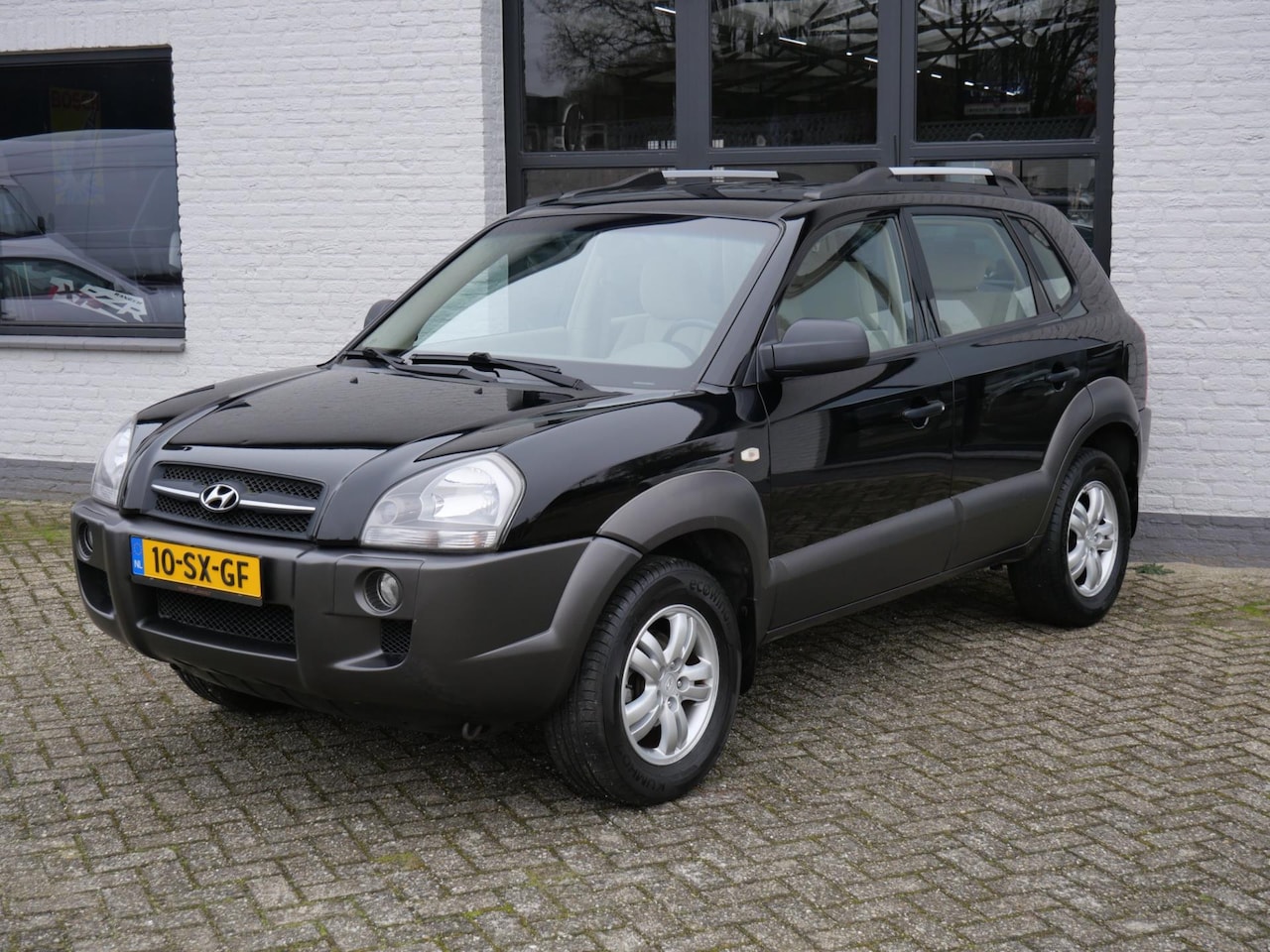 Hyundai Tucson - 2.0i Active 129.000km !!! Airco Elektrische ramen Trekhaak - AutoWereld.nl