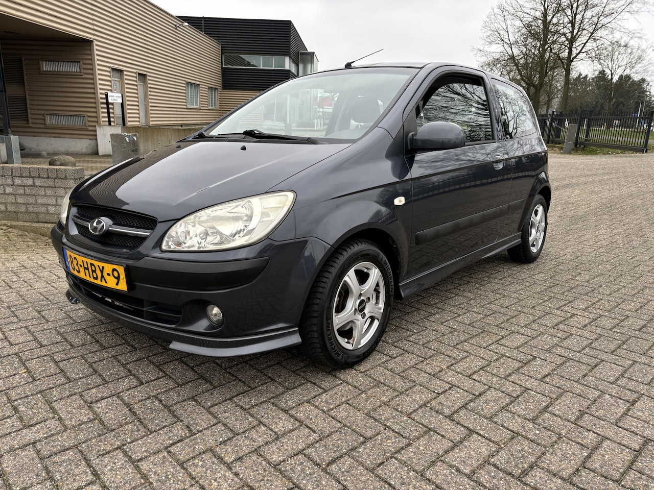 Hyundai Getz - 1.4i Active Sport [ airco,audio,lmv,spoilerset,pdc ] - AutoWereld.nl