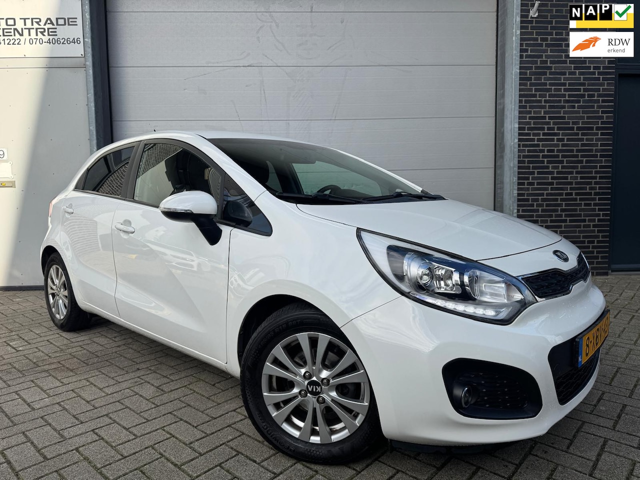 Kia Rio - 1.2 CVVT World Cup Edition [Leder|Cruise|PDC|Trekhaak|Dealer OH] - AutoWereld.nl