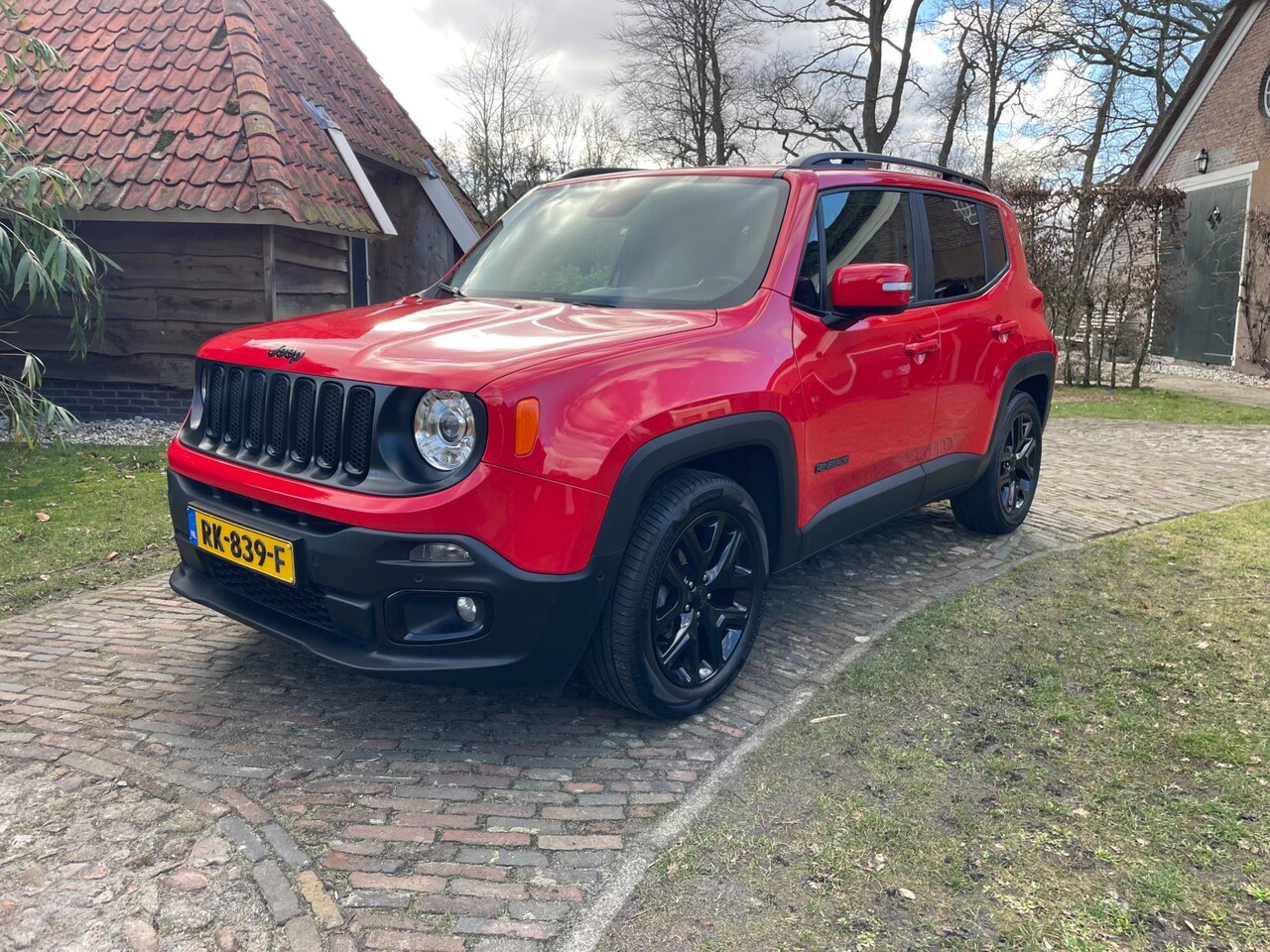 Jeep Renegade - 1.4 MultiAir Limited-140 PK-Navi-NL auto-COLORADO RED - AutoWereld.nl