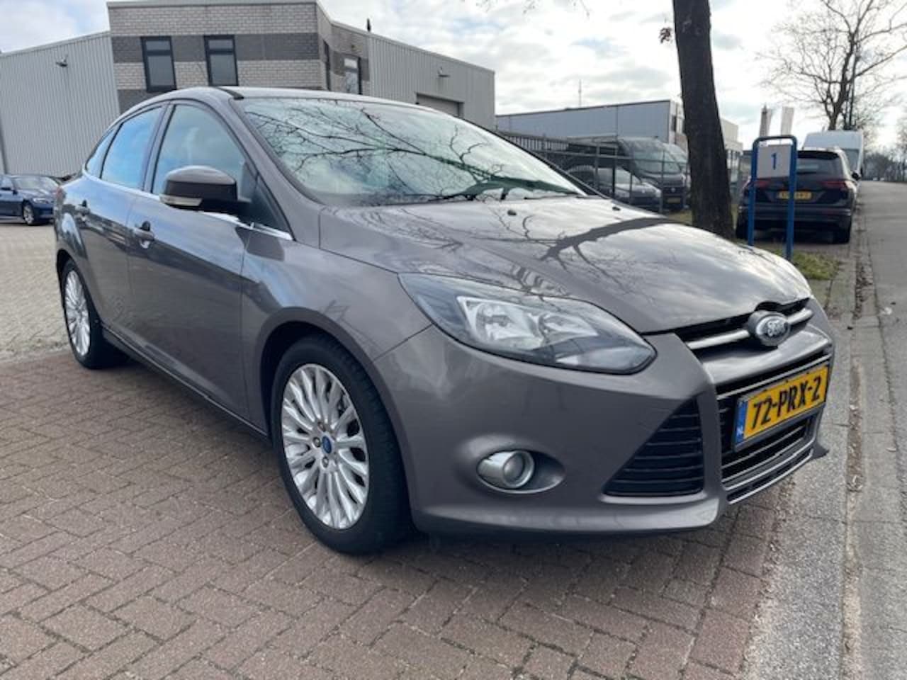 Ford Focus - 1.6 EcoBoost 150pk Titanium 170.000km Airco/ECC,Navigatie,Leder - AutoWereld.nl