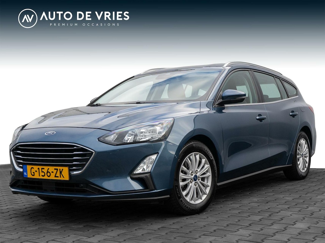 Ford Focus Wagon - 1.0 EcoBoost 125pk Titanium Business | Half leder | Navigatie | Trekhaak - AutoWereld.nl