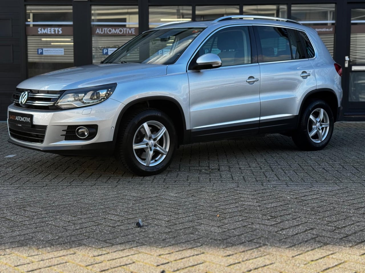 Volkswagen Tiguan - 2.0 TSI Sport&Style 4Motion,Pano,Cruise. - AutoWereld.nl