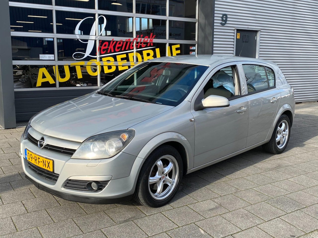 Opel Astra - 1.6 Enjoy - Airco I Comfort pakket I Familie pakket I Dealer onderhouden - AutoWereld.nl