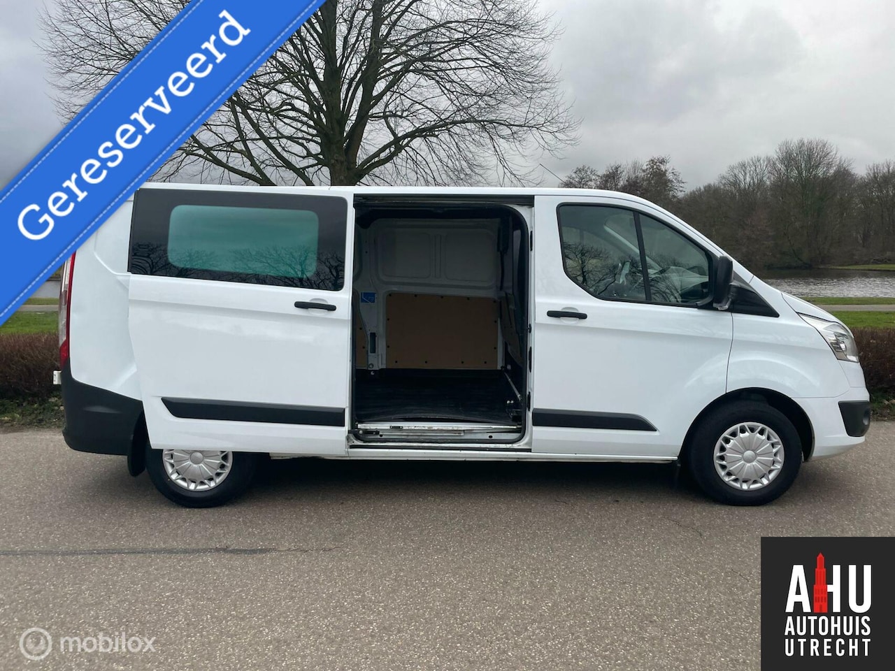 Ford Transit Custom - 2.2 TDCI L2H1/Full Option - AutoWereld.nl