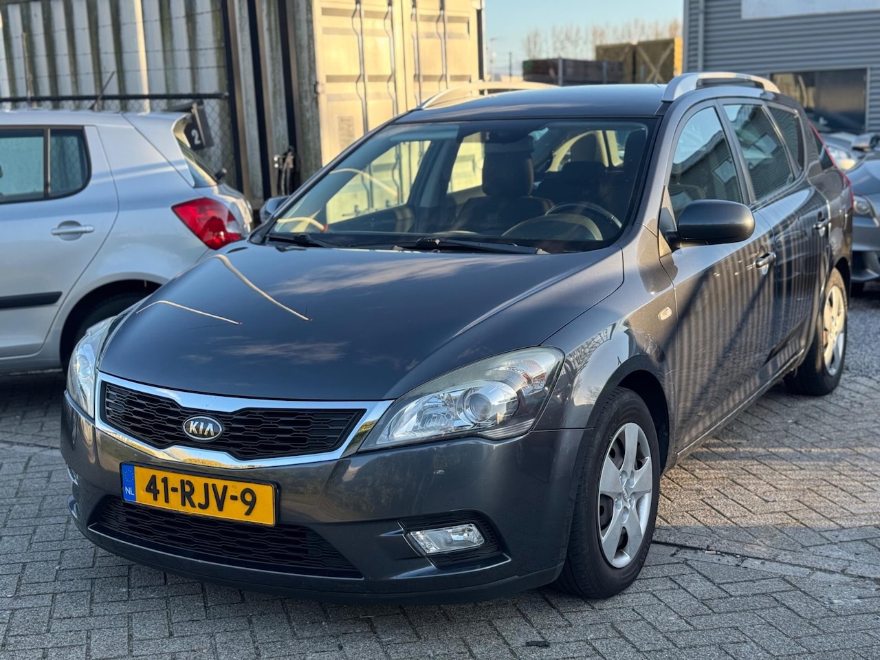 Kia Cee'd Sporty Wagon - 1.4 CVVT Comfort Pack Clima - AutoWereld.nl