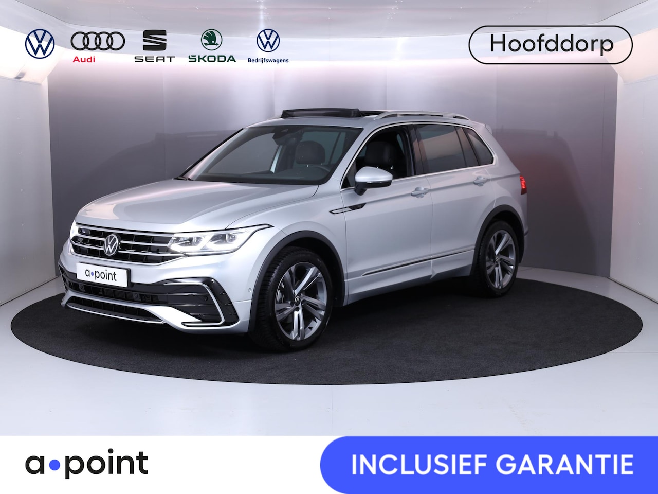 Volkswagen Tiguan - 1.5 TSI R-Line Business 150 pk Automaat (DSG) | Verlengde garantie | Navigatie | Panoramad - AutoWereld.nl