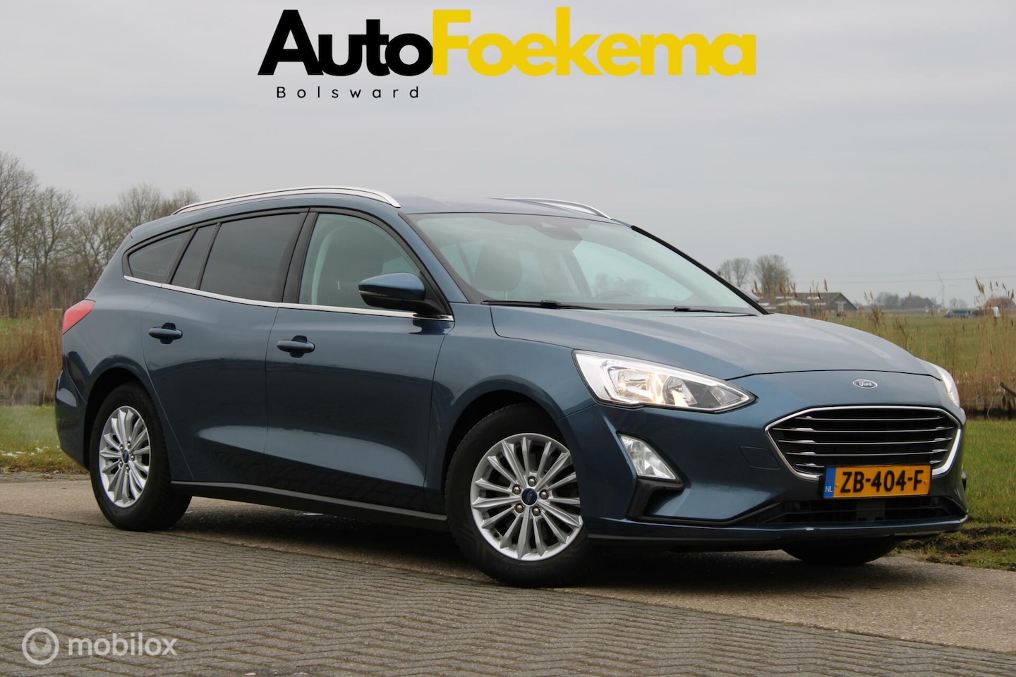 Ford Focus Wagon - 1.0 EcoBoost Titanium Business KEYLESS LED NAVI - AutoWereld.nl