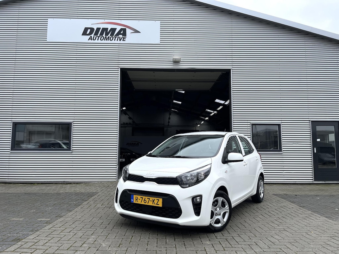 Kia Picanto - 1.0 DPi ComfortLine / Airco / Bluetooth / Cruise - AutoWereld.nl